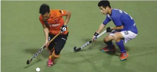  ?? – Ismail Al Farsi/TIMES OF OMAN ?? THRILLING ENCOUNTER: Action from the Asian Champions Trophy Hockey tournament between Malaysia and Korea.