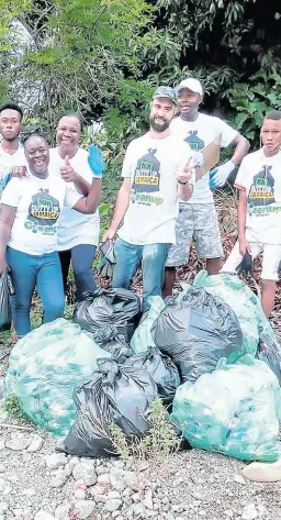  ?? BY SHANNA MONTEITH PHOTO ?? Members of the Port Morant Community Developmen­t Committee during Labour Day activites in the St Thomas-based community.