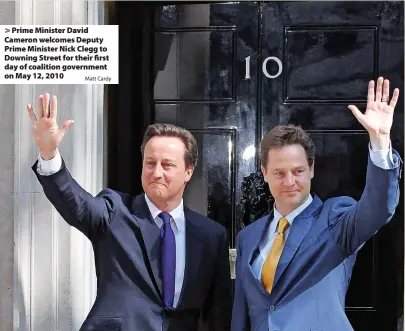  ?? Matt Cardy ?? Prime Minister David Cameron welcomes Deputy Prime Minister Nick Clegg to Downing Street for their first day of coalition government on May 12, 2010