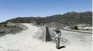  ?? Picture:
Alaister Russell ?? A fence erected on a farm near Burgersfor­t in Limpopo by Zijin Mining Group, a Chinese-owned company that started work on the Ga-Ratouw platinum mine three years ago.