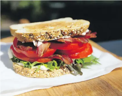  ?? PHOTOS BY DARREN STONE, TIMES COLONIST ?? Good bread, crispy bacon, ripe tomatoes and farmers-market lettuce are ingredient­s for a splendid BLT. But preference­s can vary, so Eric is asking readers to share their secrets for the classic bacon-lettuce-tomato sandwich.