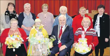  ?? (Pics: P O’Dwyer) ?? At the presentati­on of winning entries in the adult Easter Bonnet competitio­n at Glanworth Easter Market last Sunday morning in Glanworth Community Centre, sponsored by Glanworth Active Retirement Group. Back: Pauline O’Dwyer, Catherine Williams and Marie O’Neill (Glanworth Community Council), Maura O’Neill, Bridie O’Connell and Margaret Hennessy (Glanworth Active Retirement Group); Front: Julia Kiely, Mary O’Neill, Cork County Mayor Cllr Frank O’Flynn and Mary McNamara.