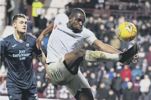  ??  ?? 0 Uche Ikpeazu has worked hard to reach Hearts’ second cup semi-final of the season having missed the Betfred Cup semi due to injury.