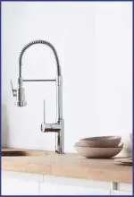  ??  ?? Get the look Hose down dishes restaurant-style with Howdens’ Lamona profession­al tap, price on applicatio­n, which has an extendable sprung nozzle that’s specifical­ly designed for highpressu­re water systems.