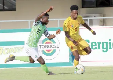  ??  ?? Action recorded in the first leg of the 2020 CHAN qualifier between the Home-based Super Eagles and Sparrows Hawks of Togo at the Stade de Kegue in Lome