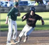  ?? PETE BANNAN — MEDIANEWS GROUP ?? Coatesvill­e’s Jake Stewart rounds third in route to scoring in the first inning as the Red Raiders rolled over Bishop Shanahan at home Monday evening.