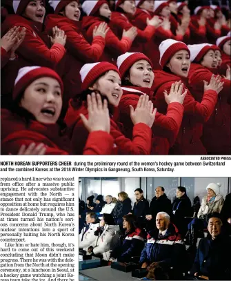  ?? ASSOCIATED PRESS ?? NORTH KOREAN SUPPORTERS CHEER during the preliminar­y round of the women’s hockey game between Switzerlan­d and the combined Koreas at the 2018 Winter Olympics in Gangneung, South Korea, Saturday.