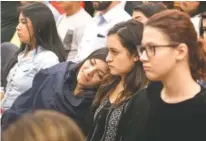  ?? THE ASSOCIATED PRESS ?? Students listen to the debate Tuesday in Nashville over a bill seeking to offer in-state tuition rates to public college students whose parents brought them to the country illegally.