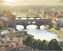  ?? GETTY IMAGES ?? The Ponte Vecchio bridge over the Arno River in Florence was finished in 1345 and is another of the city's treasures.