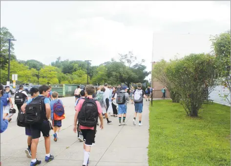  ?? DJ Simmons / Hearst Connecticu­t Media file photo ?? Students head to Bedford Middle School to start the new school year on Aug. 27, 2019. Westport schools are scheduled to reopen Sept. 1.