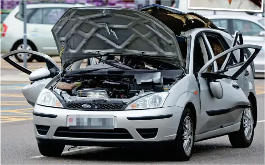  ?? Inset: A bruised Miss Druitt ?? Torn apart: The mangled wreckage of the Ford Focus after the aerosol can exploded at B&Q