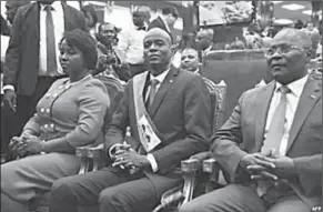  ??  ?? New Haitian President Jovenel Moise sits after receiving his sash, during his Inaugurati­on, at the Haitian Parliament in Port-au-Prince, on Feb. 7, 2017. (voanews.com)