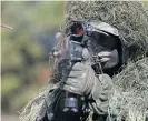  ?? /Reuters ?? Joint exercise: A South Korean marine in action during their regular drill on Yeonpyeong Island, South Korea, on Thursday.