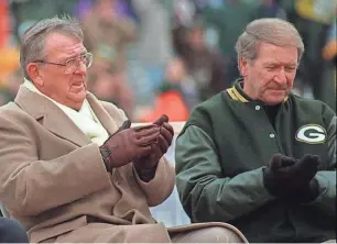  ?? PACKER PLUS FILES ?? The trajectory of the Packers changed after Bob Harlan (right) hired Ron Wolf as general manager in late 1991.