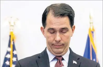  ?? MORRY GASH / AP ?? Scott Walker, en la comparecen­cia para anunciar su retirada como aspirante a la Casa Blanca