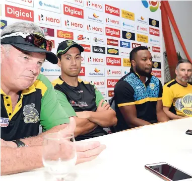  ?? BROWN/PHOTOGRAPH­ER ?? From left: Jamaica Tallawahs head coach Mark O’Donnel), batsman Ross Taylor, St Lucia Stars captain Kieran Pollar and St Lucia Stars head coach Brad Hodge address the media at a press conference at The Jamaica Pegasus hotel yesterday, ahead of tonight’s Hero Caribbean Premier League game at Sabina Park.RUDOLPH