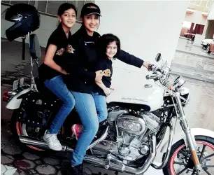  ??  ?? LIKE MOTHER... Hina Malik’s daughters aged 8 and 3 want to grow up and ride a bike like mommy.