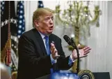  ?? Pete Marovich / Getty Images ?? President Donald Trump addressed young black conservati­ve leaders on the economy Friday as part of the Young Black Leadership Summit.