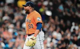  ?? Lindsey Wasson/Associated Press ?? The Astros’ Hector Neris said there was “nothing personal” about Wednesday night’s confrontat­ion with Mariners outfielder Julio Rodríguez.