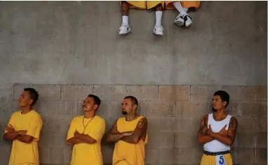  ?? PICTURE: REUTERS ?? DEMANDING: Members of the 18th Street gang attend a mass at the prison of Izalco, about 65km from San Salvador.