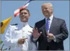  ?? SUSAN WALSH — THE ASSOCIATED PRESS ?? President Donald Trump meets U.S. Coast Guard Academy graduate Brendan Ryan Sullivan during commenceme­nt exercises at the U.S. Coast Guard Academy in New London, Conn., on Wednesday. More photos at middletown­press.com.