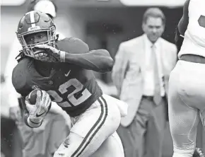  ?? MARVIN GENTRY/USA TODAY SPORTS ?? Alabama running back Najee Harris carries during the Crimson Tide’s 2019 spring game in Tuscaloosa, Ala.