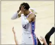  ?? MATT SLOCUM — THE ASSOCIATED PRESS ?? Philadelph­ia 76ers’ Matisse Thybulle, left, reacts after fouling Atlanta Hawks’ Kevin Huerter, right, during the second half of Game 7 in a second-round NBA basketball playoff series Sunday in Philadelph­ia.