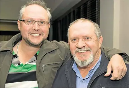  ?? PHOTOS: NEV MADSEN ?? IT’S A BLOKE THING: Justin (left) and Jon Schulz enjoy the road show about men’s health.