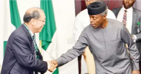  ??  ?? Vice President Yemi Osinbajo (right) welcomes the Leader of the Chinese Investors and Chief Agronomist, Prof. Zhao Zhihai, during the leader’s meeting with the vice president at the Presidenti­al Villa in Abuja yesterday