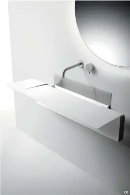  ??  ?? 01 The Ala basin is attached to the wall only by its brushed stainless steel splashback, creating an elegant floating effect. 01