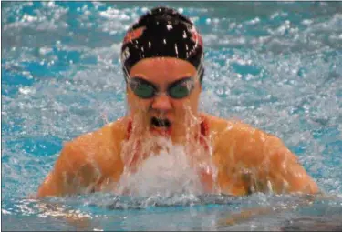  ?? JON BEHM — THE MORNING JOURNAL ?? Rocky River senior Laura Banks swims the 100 breaststro­ke at the D-I State swim meet at C.T. Branin Natatorium in Canton on Feb. 25. Banks took 15th with a time of 1:05.30.