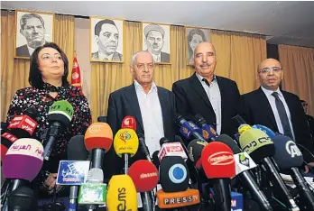  ?? AFP ?? Members of the winning organisati­ons (from left) Wided Bouchamaou­i, Houcine Abbassi, Abdessatta­r ben Moussa and Mohamed Fadhel Mahmoud