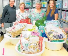  ?? ?? Bundles of Joy were presented to The Hub this week. Pictured are Hub administra­tor Danielle Nichols (left), Anna Delaney and Janine ColpmanKin­g from Soroptimis­t Internatio­nal Taupō and Ellie Godwin, Pregnancy Help co-ordinator.