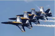  ?? JOHN MCCALL Sun Sentinel file ?? The Blue Angels flew over Miami Beach this past weekend.