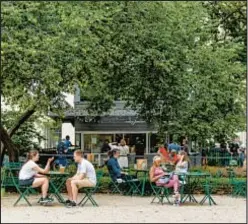  ?? GETTY IMAGES ?? People hanging out in Madison Square Park, which will be the southern border of city’s plan to create pedestrian plazas around Broadway, stretching north to Herald Square.