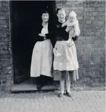  ??  ?? Pictured outside of Kate Hall’s shop in Moira Street around 1960, from left to right are: Kate Hall, Brenda Billson, Gary Billson - Brenda and Derek’s son.