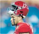  ?? MICHAEL REAVES/GETTY IMAGES ?? Dolphins coach Brian Flores and GM Chris Grier are non-comittal about how soon No. 1 pick Tua Tagovailoa would see the field.