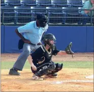  ?? ALEX FARRER / staff ?? Calhoun’s Adella Carver catches during Game 1 of Tuesday’s GA-Tenn. All-Star Softball Classic.