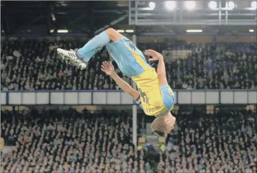  ?? PICTURE: PETER BYRNE/PA ?? UPSIDE DOWN: Will Vaulks celebrated his consolatio­n goal for Rotherham United at Everton last night with an eye-catching somersault.