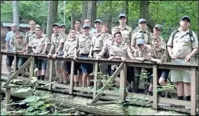  ?? CONTRIBUTE­D PHOTO ?? Troop 22 on the bridge to their campsite just before closing ceremonies. Not pictured, Hayden Bullington.