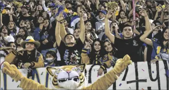  ?? PHOTO
CORISSA IBARRA ?? The Brawley Wildcat faithful cheer on their team during Friday night’s Bell Game against Central Union High School in El Centro.