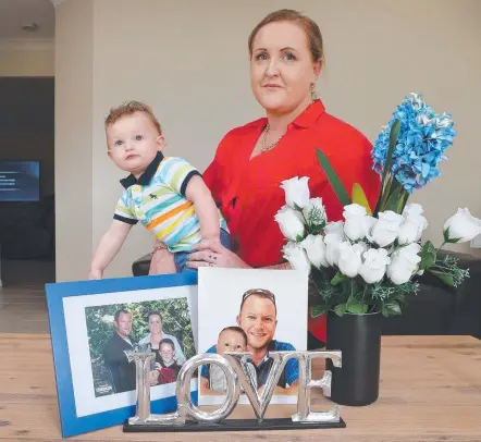  ??  ?? Nicole Astill, of Banora Point, wants her baby Henry Astill-Foresi, 11 months, to learn from the death of her partner and “love of her life”, Pat Foresi. Picture: GLENN HAMPSON