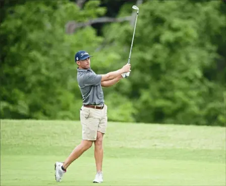  ?? Haldan Kirsch/ Post- Gazette photos ?? Daniel Obremski hits from the fairway Wednesday in the second round of the WPGA Open Championsh­ip at Valley Brook Country Club in Canonsburg, Pa. He enters the final round trailing leader Beau Titsworth by five shots.