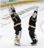  ?? AP ?? Bruins goaltender­s Linus Ullmark (left) and Jeremy Swayman celebrate after defeating the Red Wings Saturday in Boston.