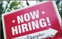  ?? ?? A ‘now hiring’ sign is posted in Garnet Valley, Pennsylvan­ia, Monday, May 10, 2021. (AP)