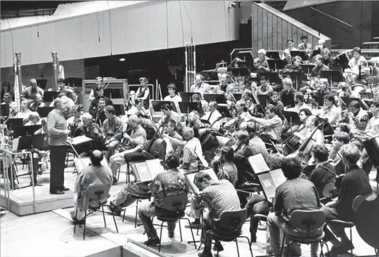  ?? Archie Kent
ull stei n bil d ?? Boulez leads a rehearsal of the Berlin Philharmon­ic in 1994. As a firebrand music student, he booed Igor Stravinsky in Paris for being too conservati­ve, and he later called for the burning down of opera houses. “History should be absorbed and rejected,” he said. “If you are drowned in a library, you never have your own personalit­y.”