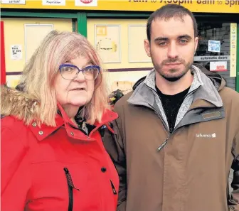  ??  ?? Logging on Geraldine Baird and Councillor Martin Lennon are keen to set up a webcam on Rutherglen Main Street