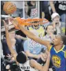  ?? AP PHOTO ?? In this May 22 file photo, San Antonio Spurs guard Dejounte Murray has his shot blocked by Golden State Warriors’ Kevin Durant during NBA playoff aaction in San Antonio.