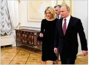  ?? MIKHAIL KLIMENTYEV / SPUTNIK ?? NBC News’ Megyn Kelly walks with Russian President Vladimir Putin before a recent interview in the Kremlin in Moscow. In the interview Putin denied he ordered meddling in the November 2016 vote.