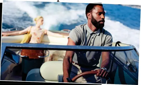  ??  ?? Post-pandemic blockbuste­r: Tenet stars Elizabeth Debicki and John David Washington